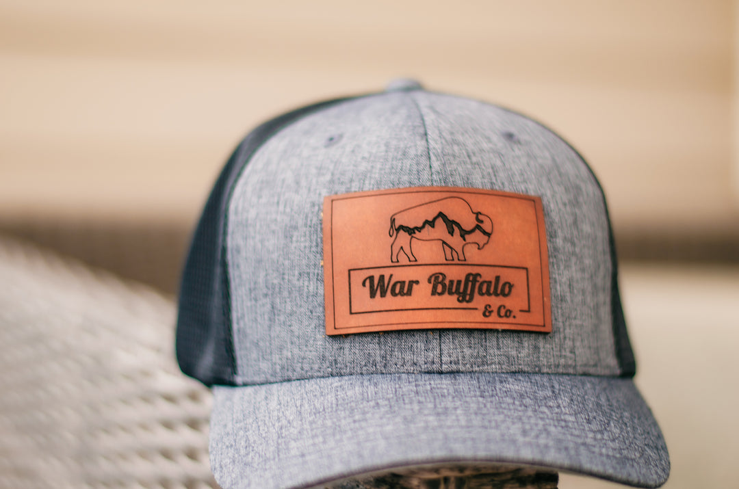 Custom Leather Patch Yupoong Trucker Hat – War Buffalo Company